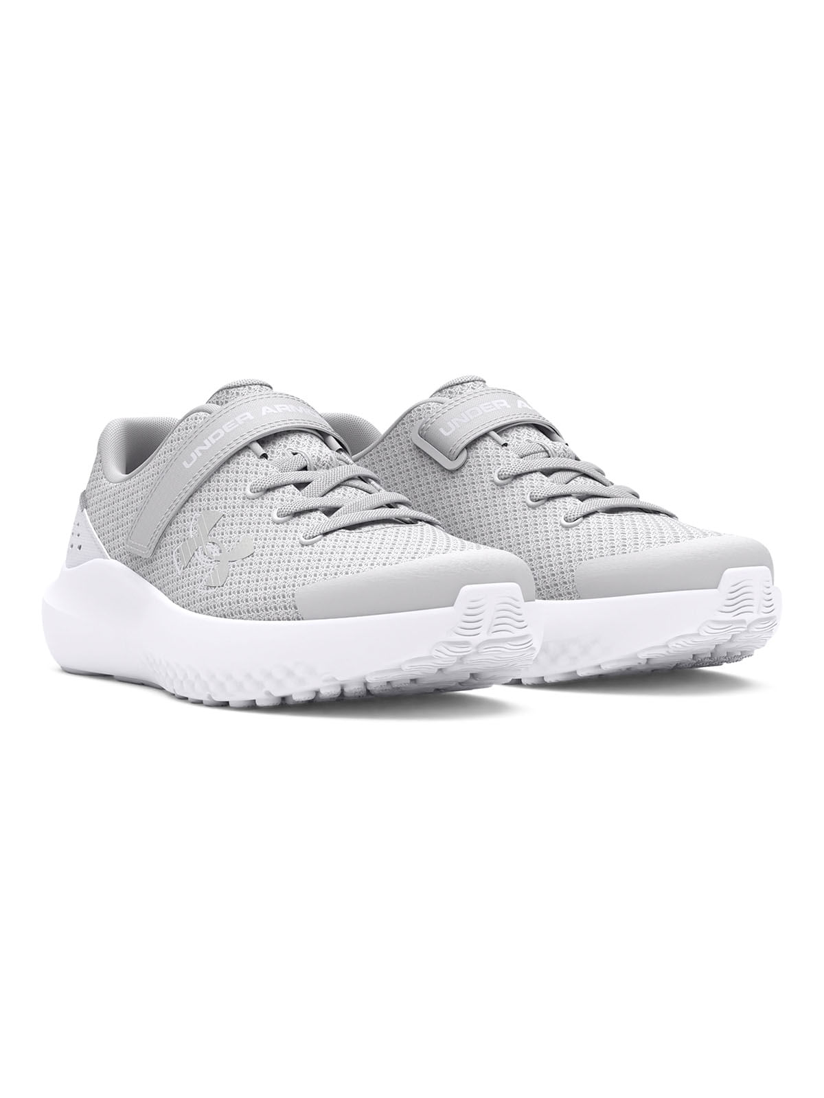 Zapatillas de running UA Surge 4 AC gris para niñas
